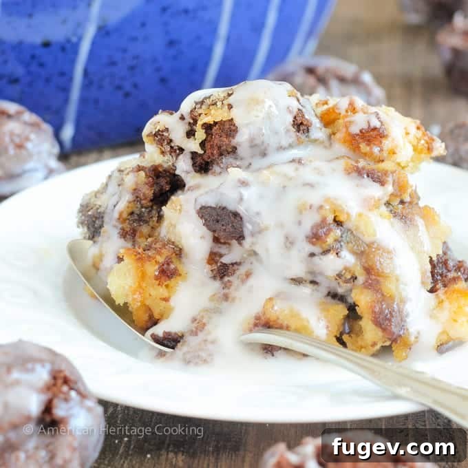 Decadent Coffee Donut Pudding 3 Close-up of Coffee Donut Bread Pudding, showcasing the soft cake donuts soaked in a dark coffee custard.