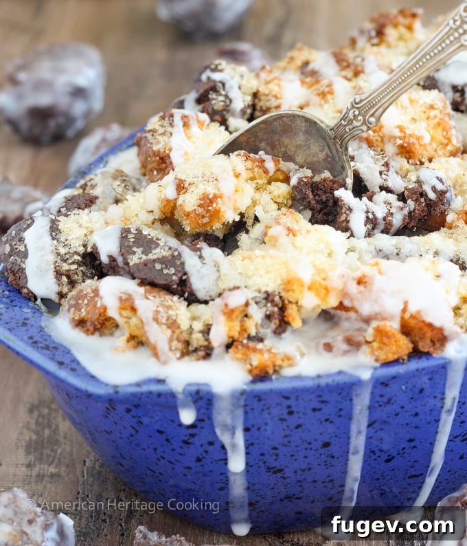 Decadent Coffee Donut Pudding 6 A slice of Coffee Donut Bread Pudding on a plate, garnished with a sweet donut glaze, ready for a special breakfast or dessert.