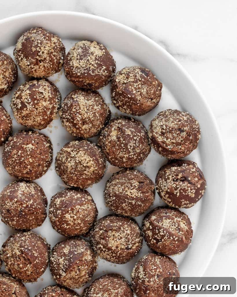 Chocolate cookie dough balls rolled in turbinado sugar