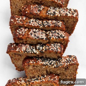Sliced Tahini Banana Bread with chocolate chunks and sesame seeds