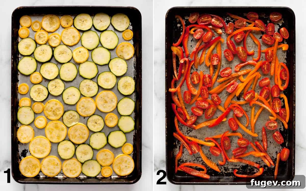 Roasted Garden Vegetable Naan Flatbread 4 Two baking sheets: one with seasoned sliced zucchini and yellow squash, and another with seasoned sliced bell peppers and halved grape tomatoes, ready for roasting.