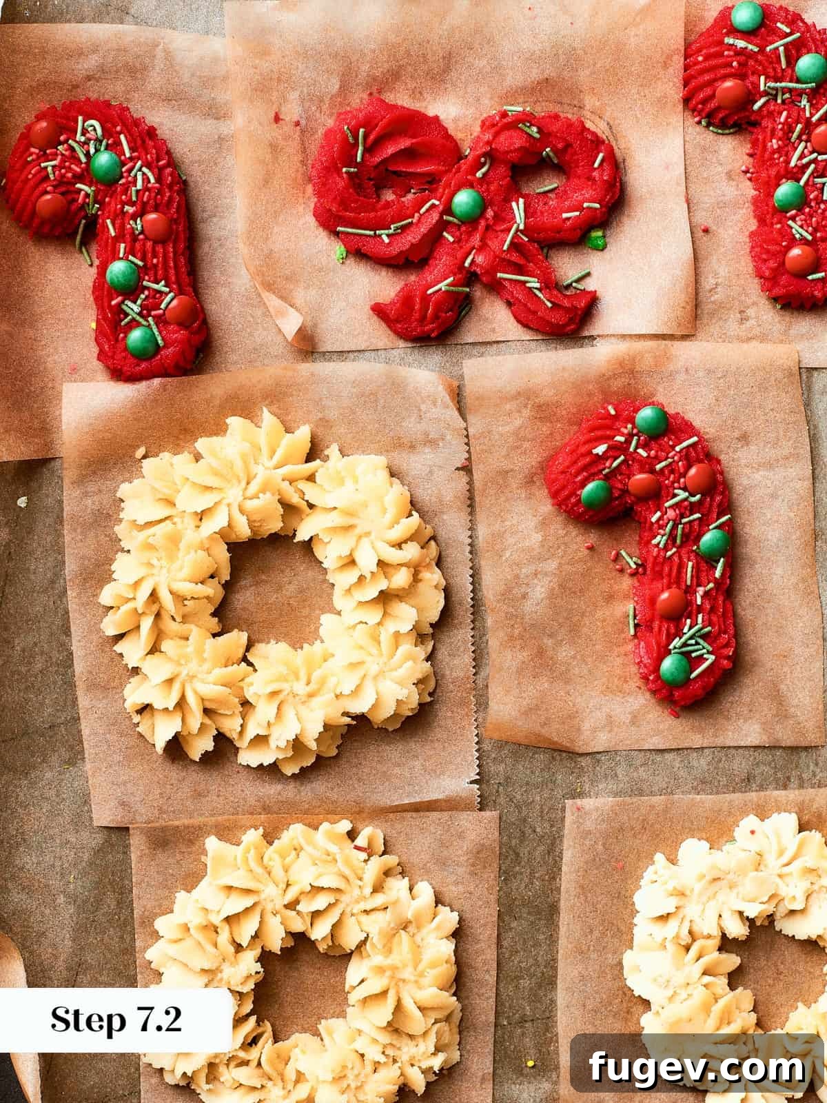 Easy Spritz Cookie Perfection 11 Unbaked cookie dough piped into festive candy cane, bow, and wreath designs for spritz cookies.