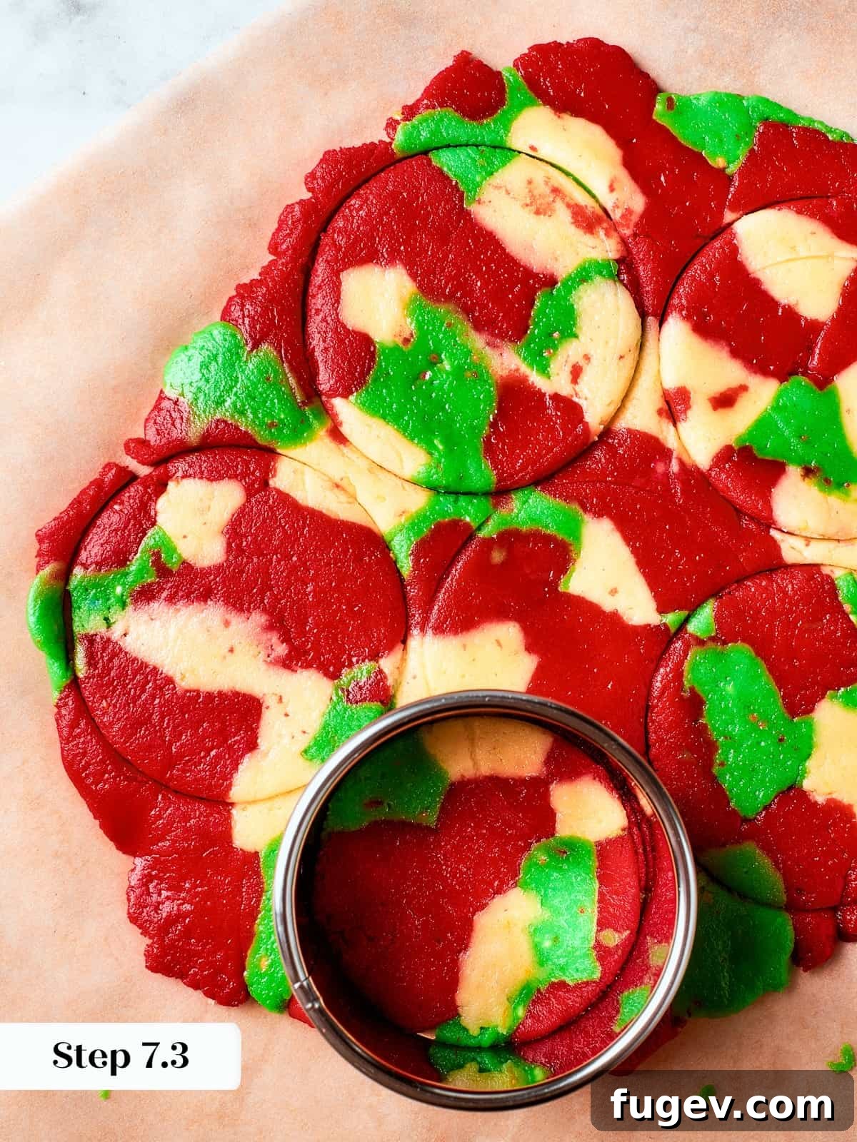 Easy Spritz Cookie Perfection 12 Green, red, and plain dough cut into shapes ready to bake for colorful spritz cookies.