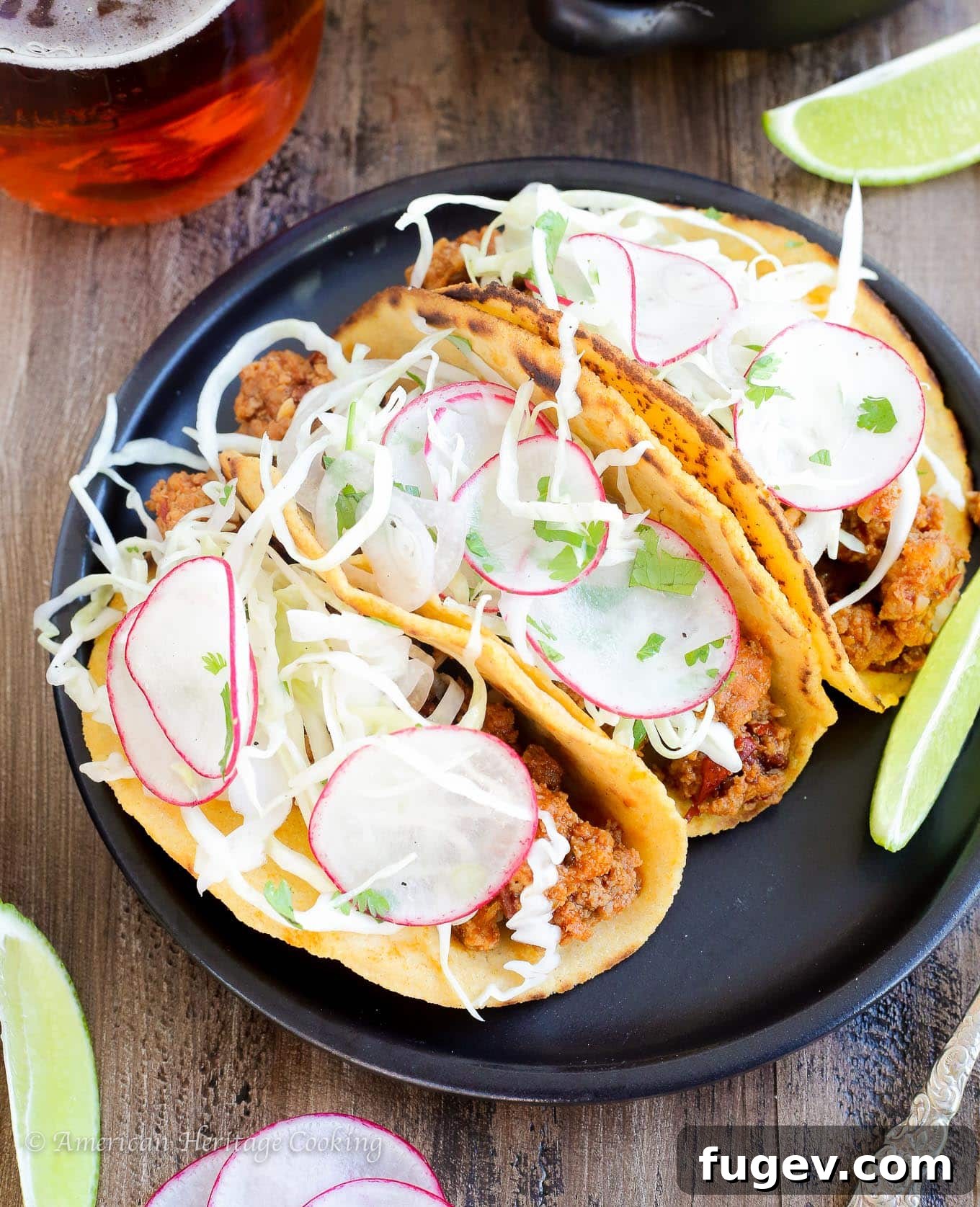Chipotle Infused Chorizo Tacos 4 A chef's hand gently placing fresh cilantro on a Chipotle Chorizo Taco, emphasizing the care and detail in the recipe.