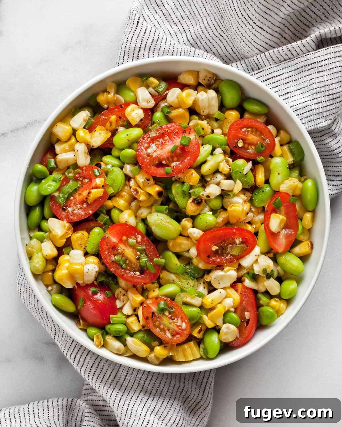 Sunshine Succotash with Edamame and Corn 3 Grilled corn succotash in a rustic bowl, ready to be served.