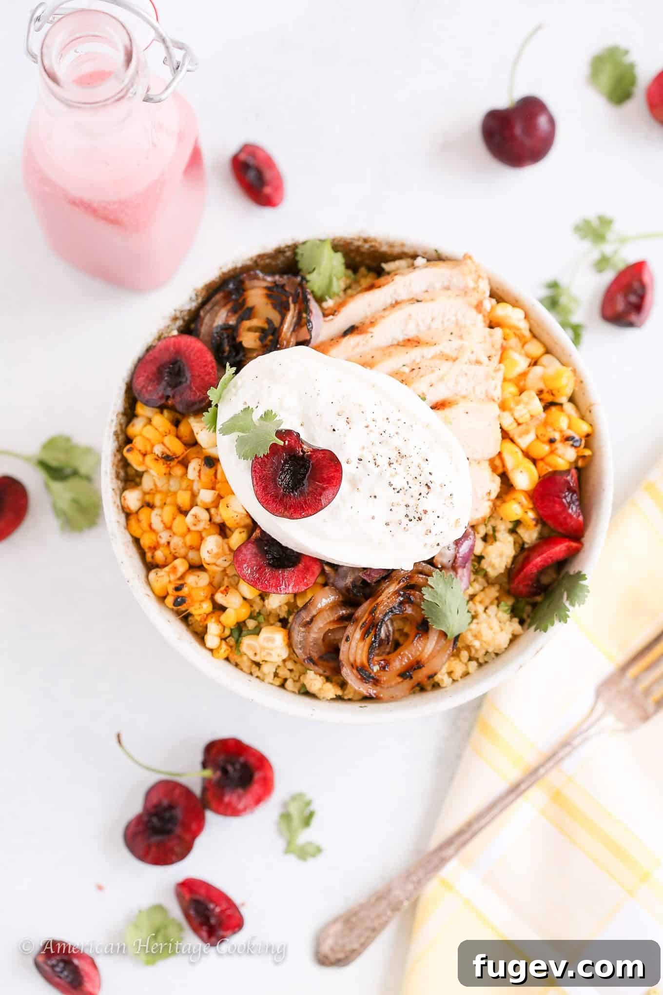Creamy Burrata Cherry Millet Bowl 2 A beautifully arranged Cherry Burrata Millet Grain Bowl with nutty millet, grilled chicken, fresh cherries, creamy burrata, and a vibrant cherry vinaigrette.
