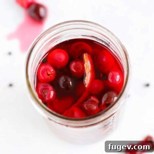 Pickled Cherries in mason jar with liquid