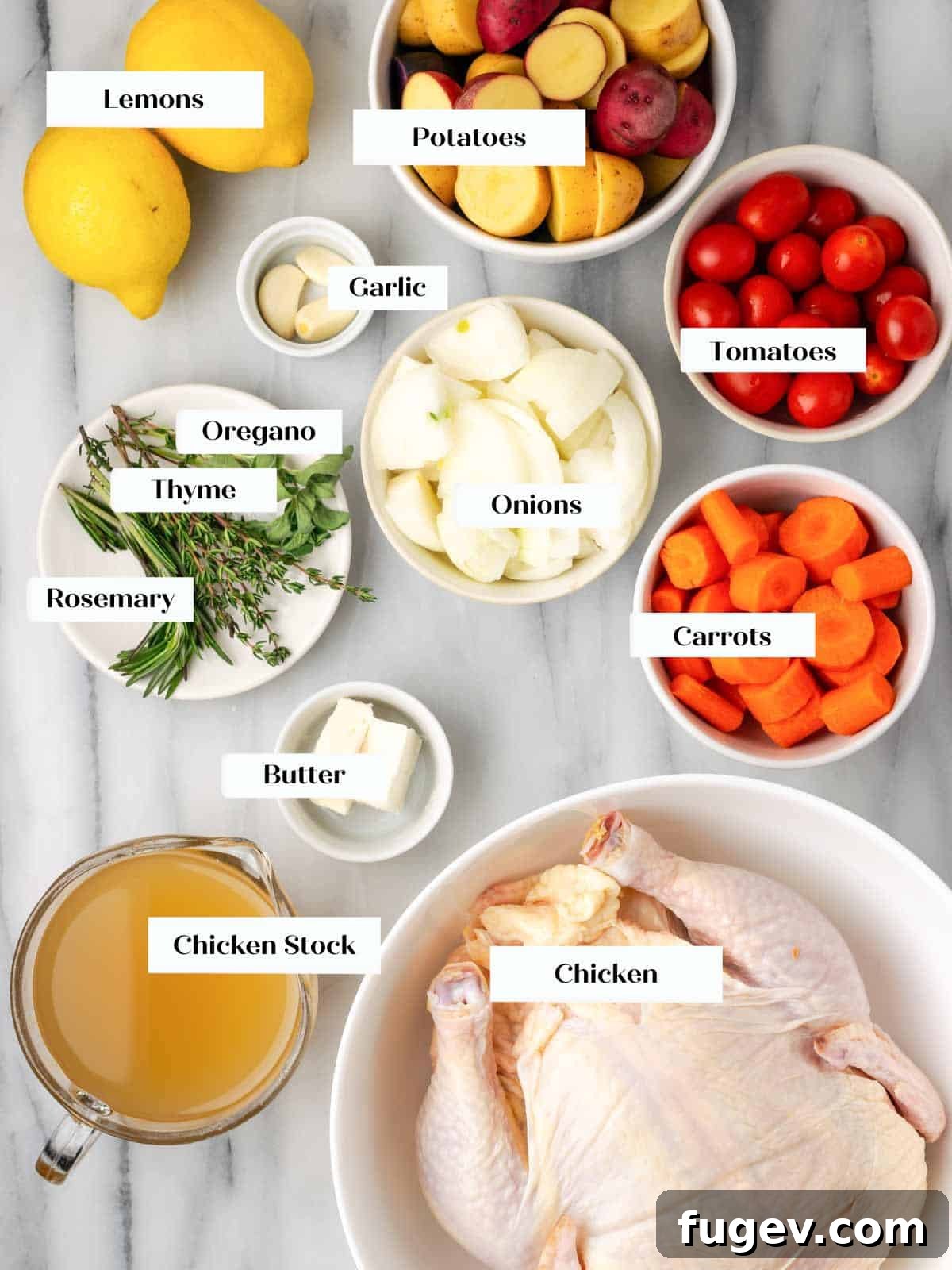 Zesty Lemon Roasted Chicken 4 ingredients for roasted lemon chicken on marble.
