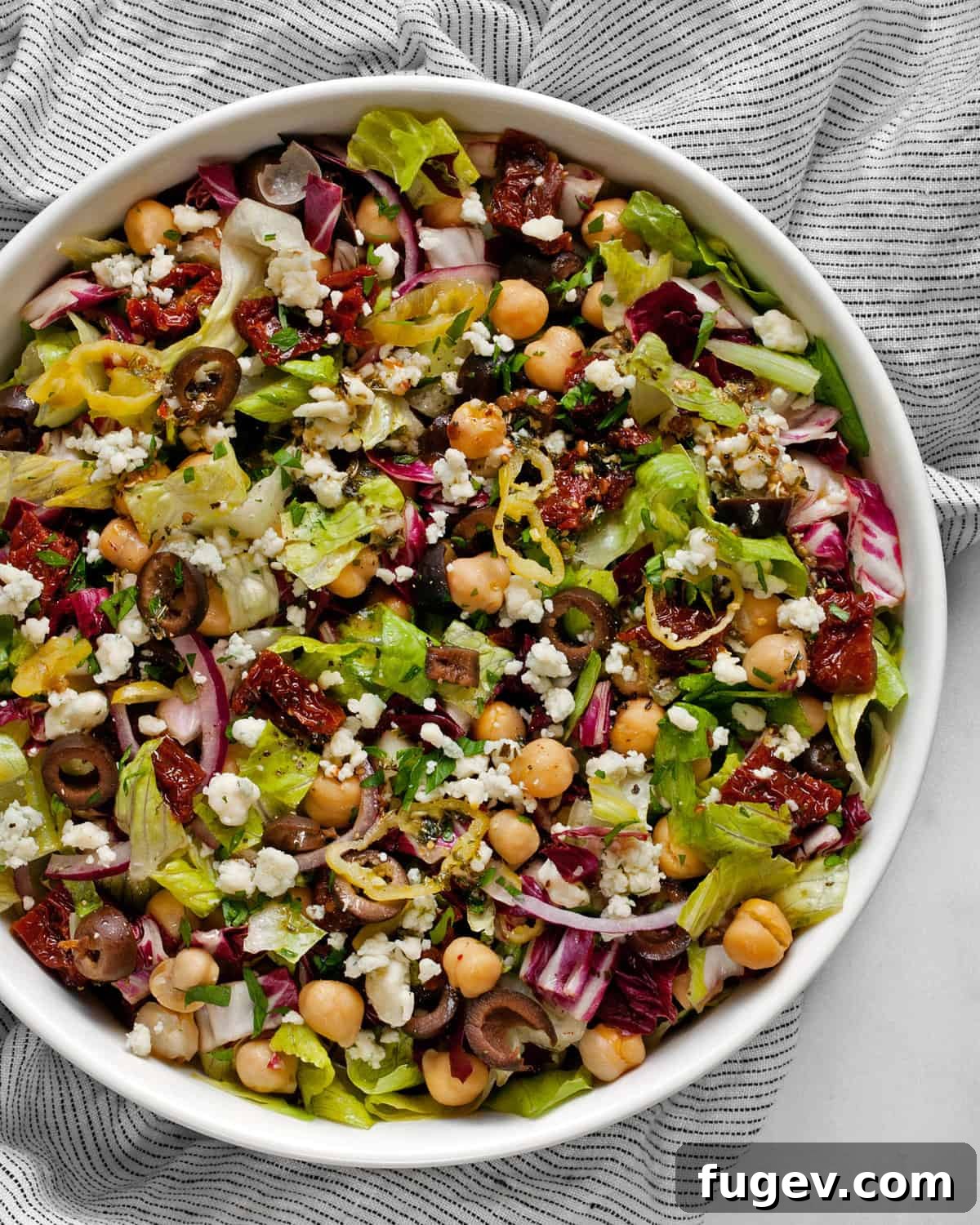 Vibrant Italian Chopped Salad 2 A large serving bowl with an Italian chopped salad, showcasing its vibrant ingredients.