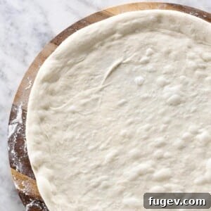 Sourdough Pizza Dough stretched and ready for topping