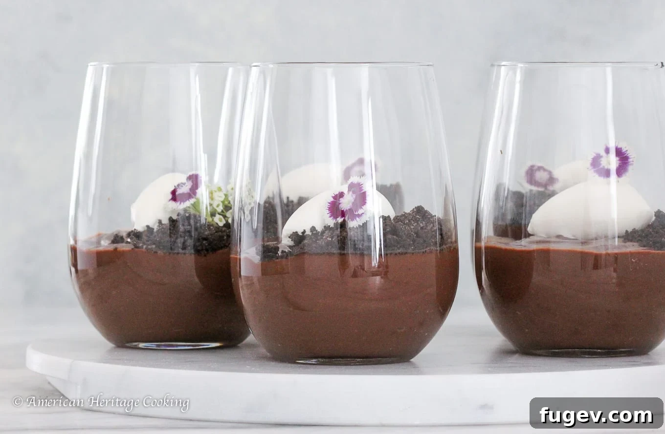 Decadent Homemade Chocolate Pudding 4 A vibrant close-up of rich, creamy dark chocolate pudding in a glass cup, perfectly smooth.