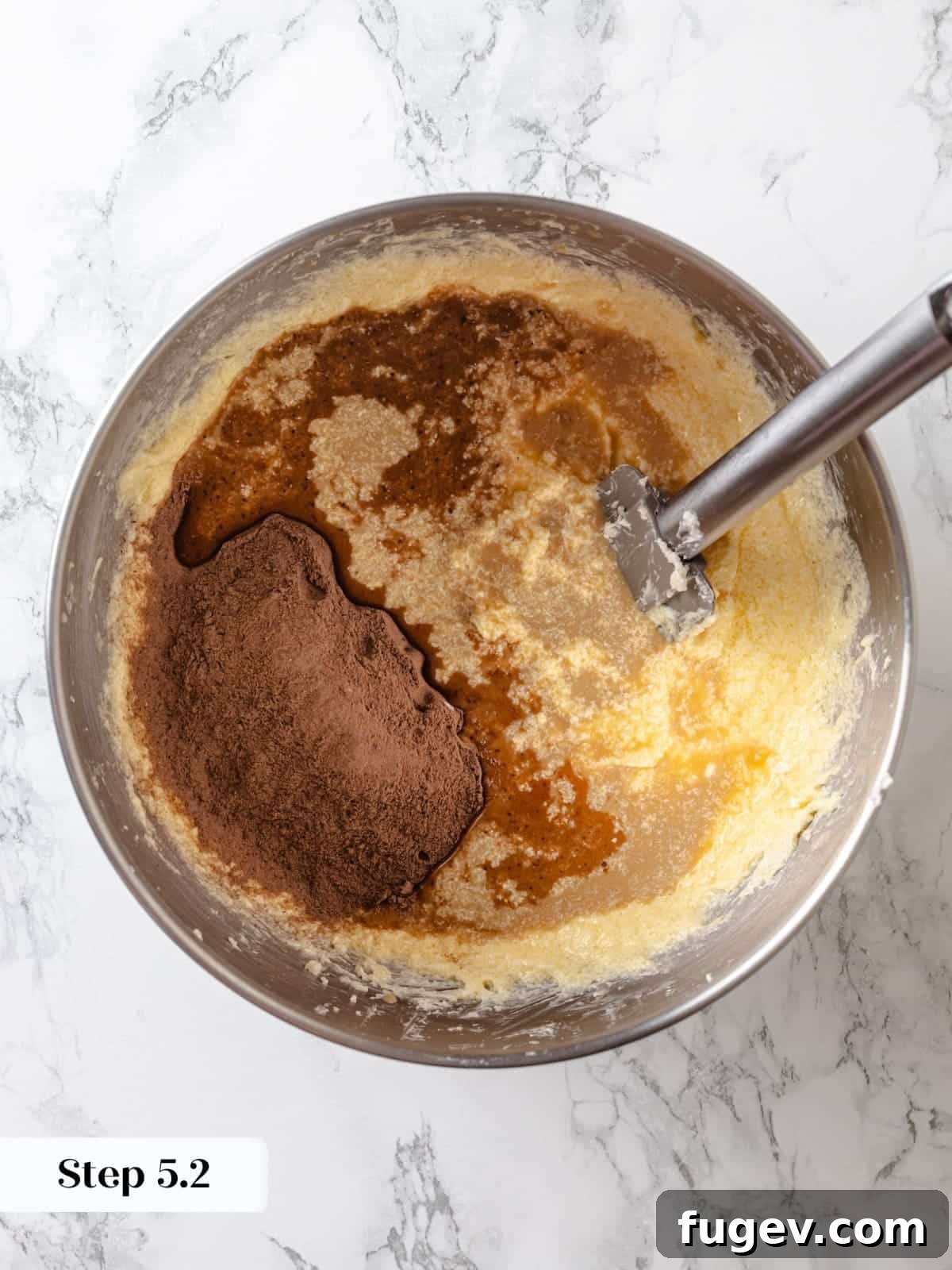 Sinfully Rich Chocolate Delight 11 Alternately adding the flour and cocoa blend to the wet mixture in the stand mixer, gradually forming the Devil’s food cake batter.