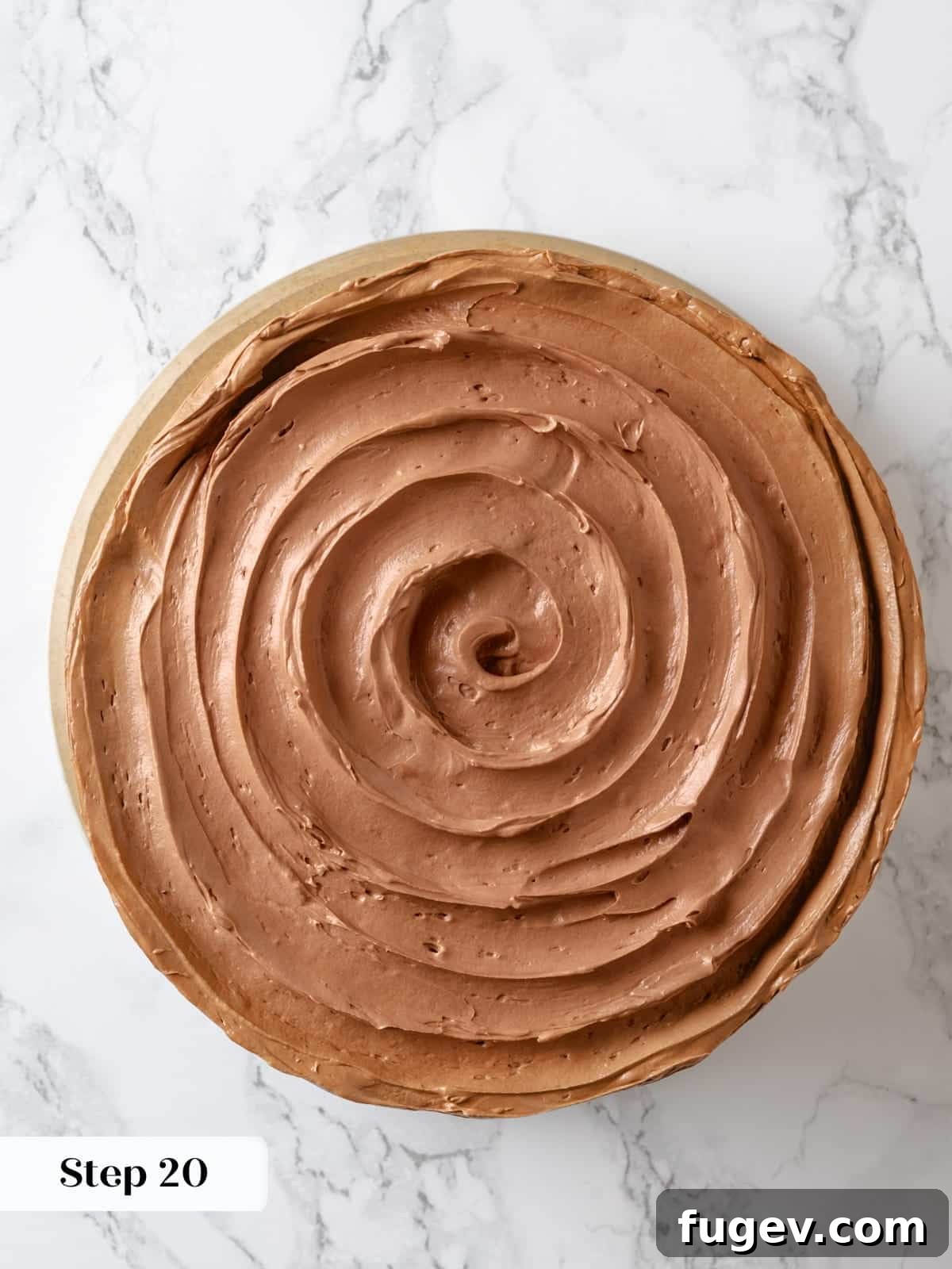 Sinfully Rich Chocolate Delight 24 The top of the Devil’s food cake is elegantly finished with artistic swirls created by a frosting spatula or spoon.