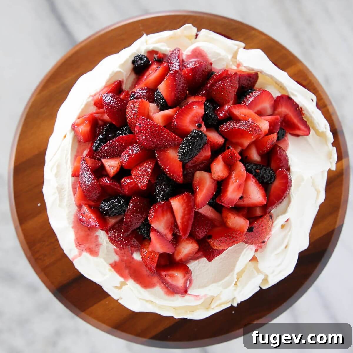 Zesty Berry Pavlova Dream 5 A grand Lemon Berry Pavlova Cake sits regally on a polished marble countertop, showcasing its crisp shell and elegant shape, prepared for a celebration.