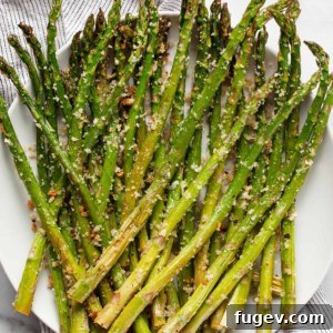 Parmesan roasted asparagus on a plate.