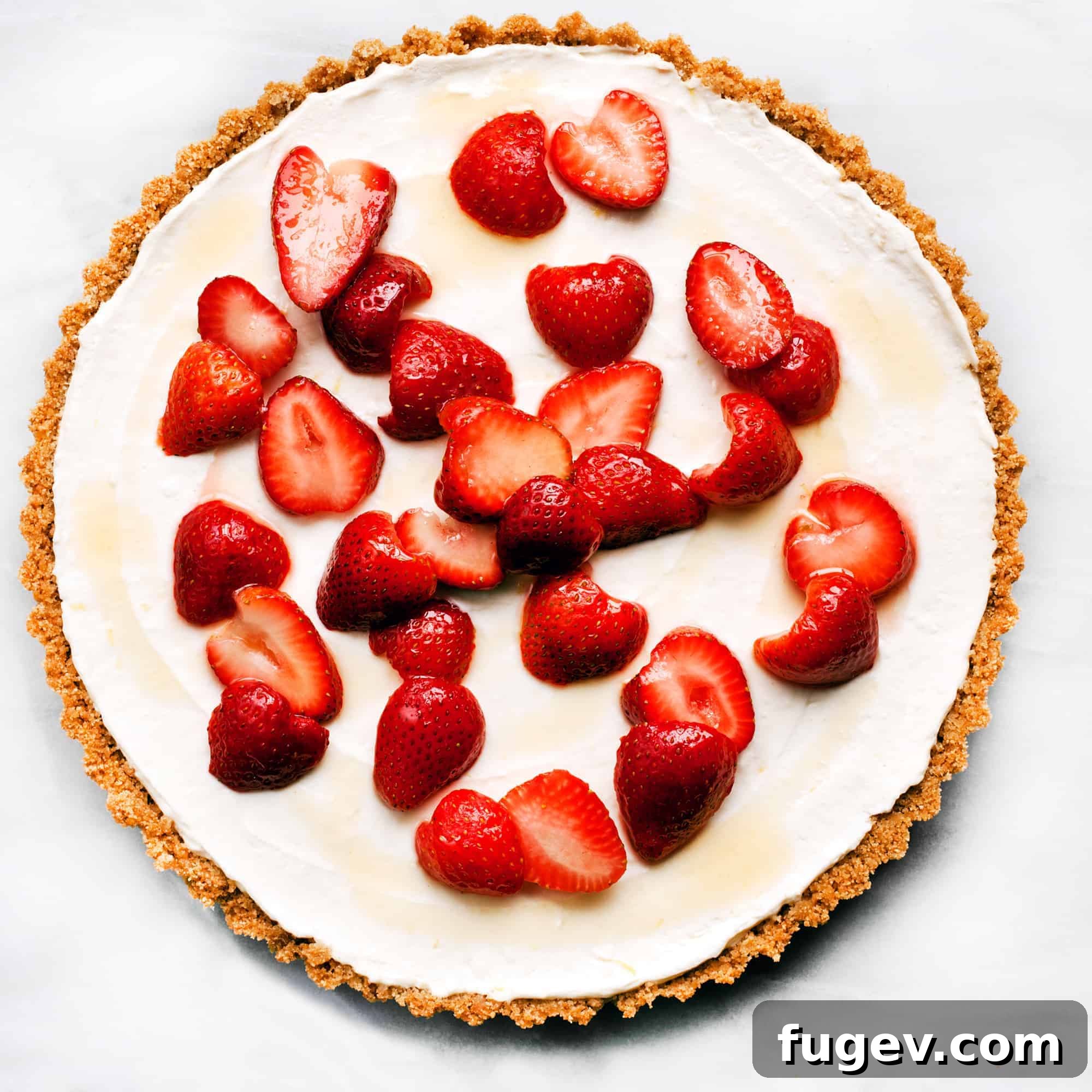 Dreamy No-Bake Ricotta Cheesecake 2 No-Bake Ricotta Cheesecake with strawberries on top