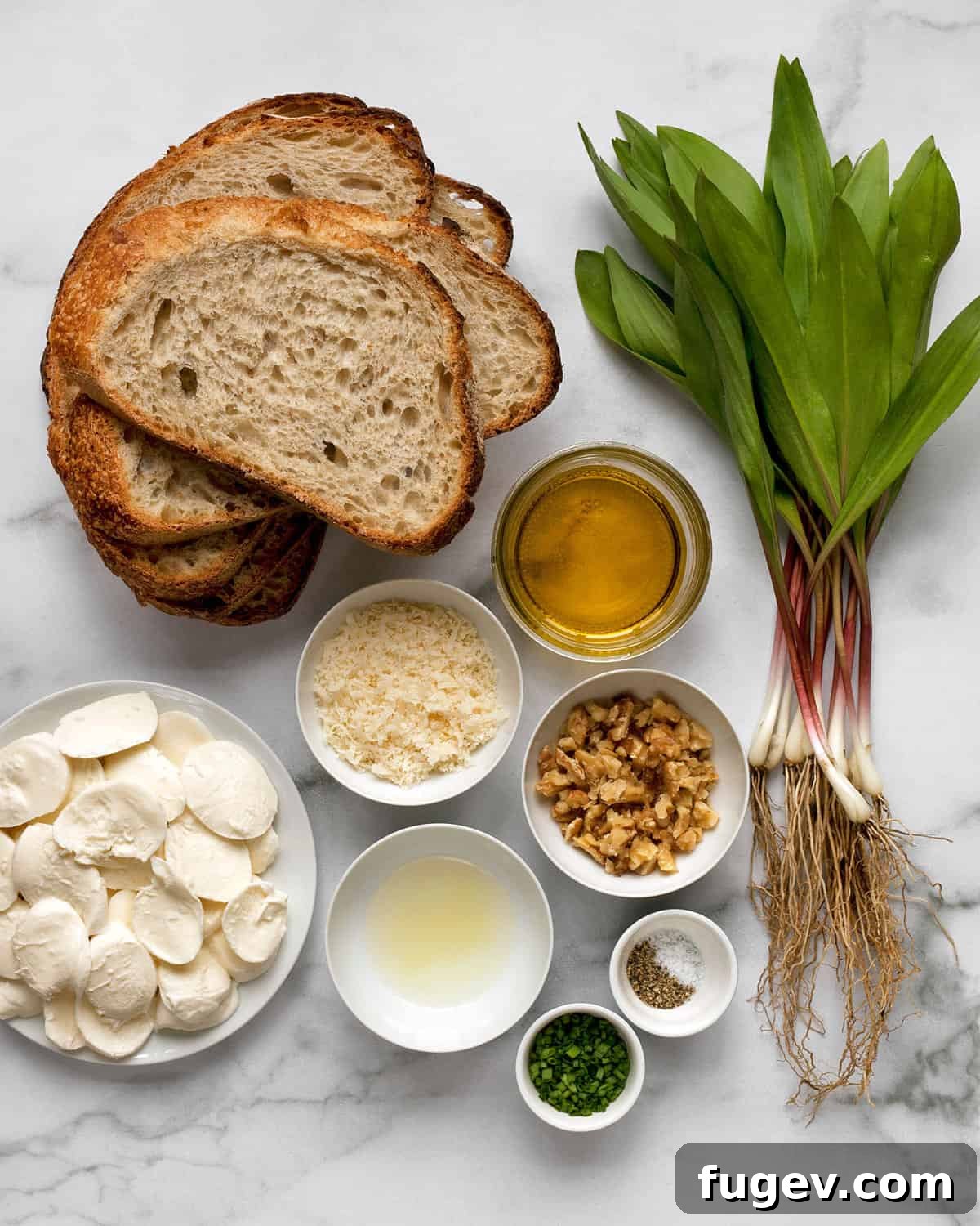 Ramp Duo Garlic Bread 3 Ingredients including bread, ramps, mozzarella, walnuts, olive oil, lemon juice, Parmesan, chives, salt and pepper