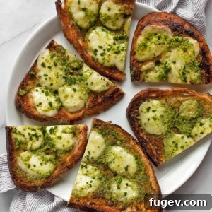 Slices of ramp garlic bread on a plate.