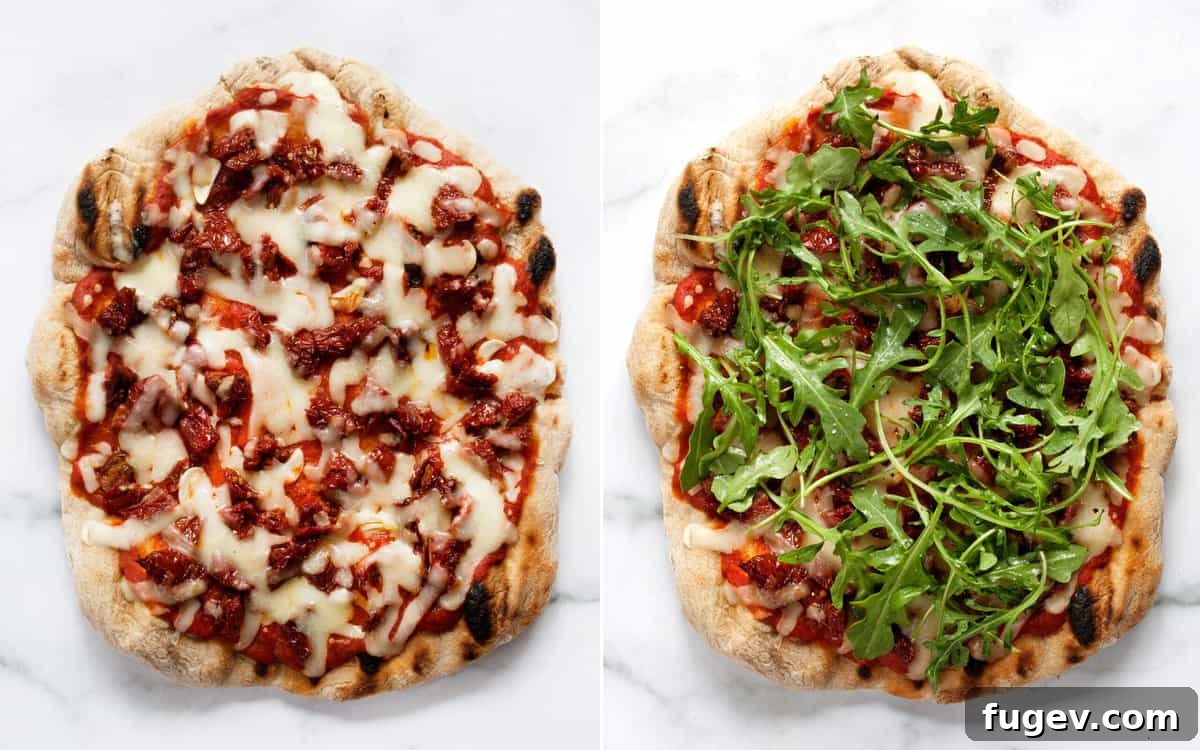 Charred Arugula and Sun-Kissed Tomato Pizza 6 Cooked pizza with melted cheese, garnished generously with fresh green arugula.