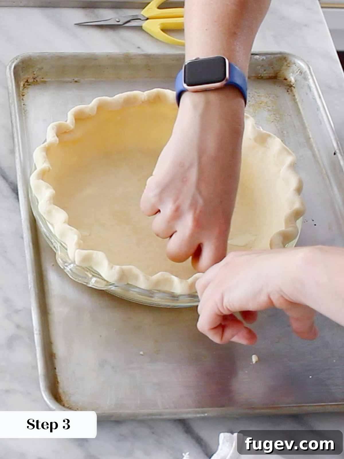 Whiskey-Kissed Pecan Dream 6 Demonstration of fluting pie dough edges, creating an elegant and professional finish.