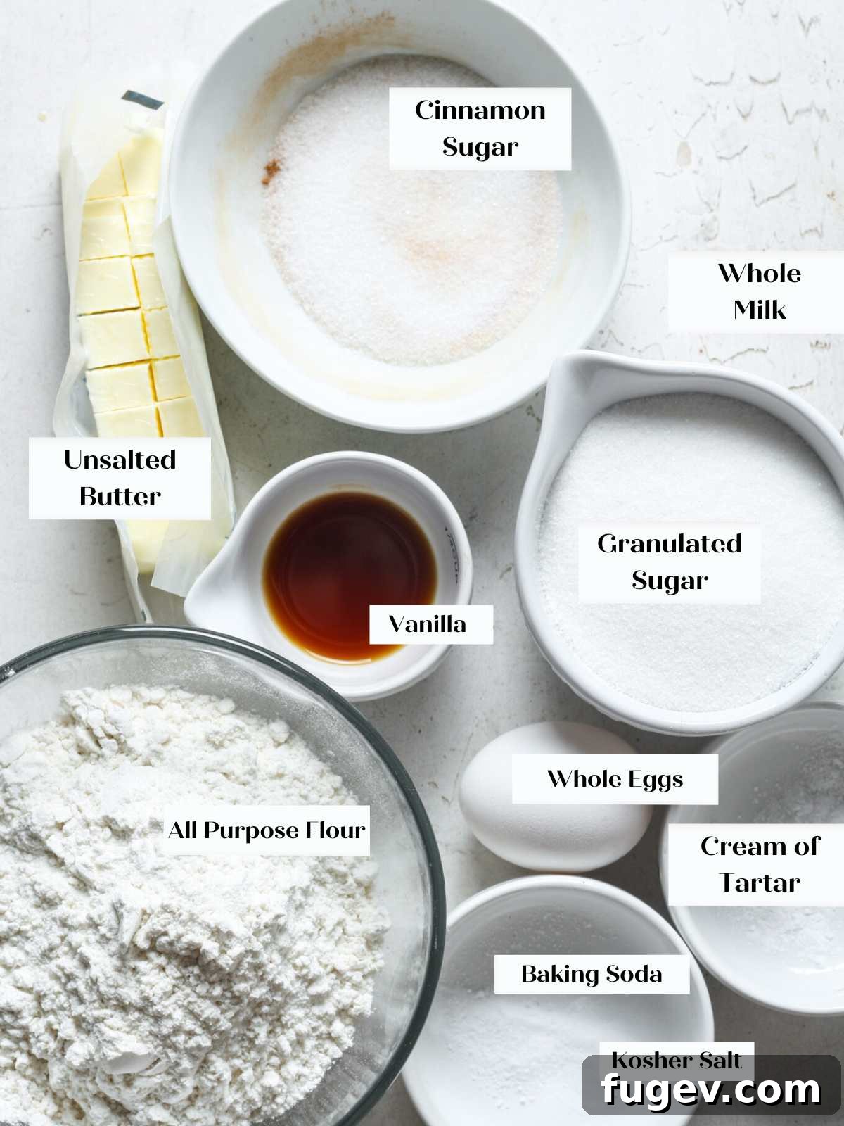 Your New Favorite Snickerdoodle Recipe 4 All the essential ingredients for the best snickerdoodle cookie laid out on a marble surface.