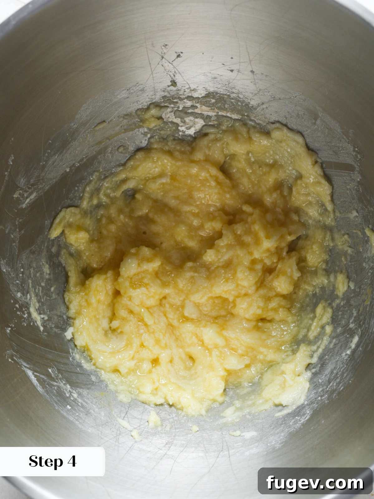 Your New Favorite Snickerdoodle Recipe 7 Adding eggs one by one to the mixing bowl with creamed butter and sugar.