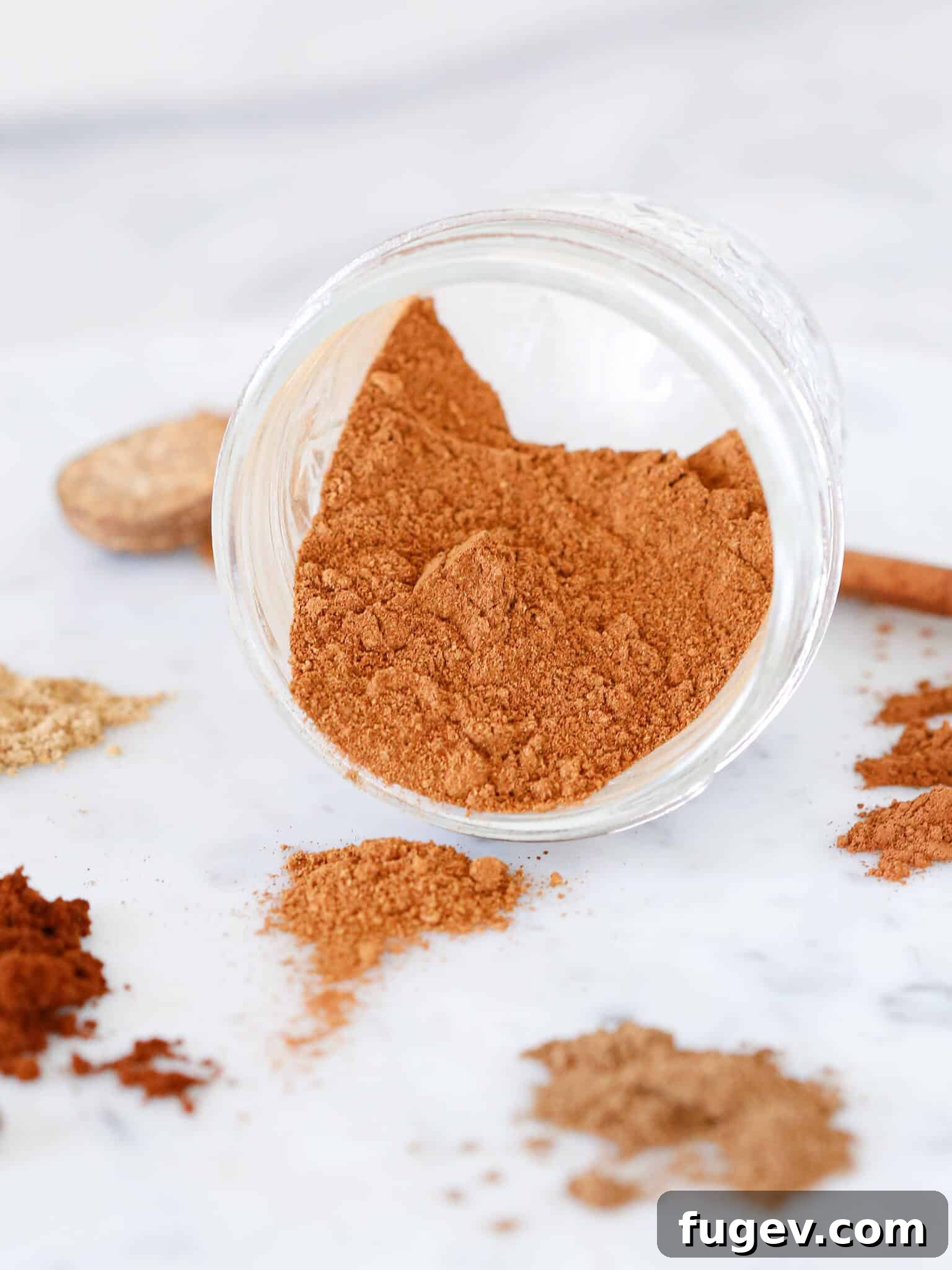 Homemade Pumpkin Spice Delight 5 Freshly mixed pumpkin spices in a glass jar, ready for use.