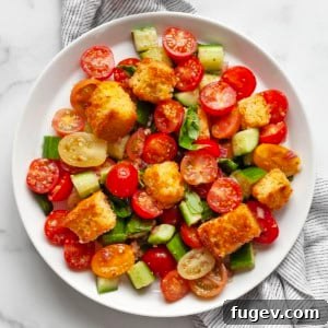 Cornbread Panzanella Salad on a plate, ready to be enjoyed.