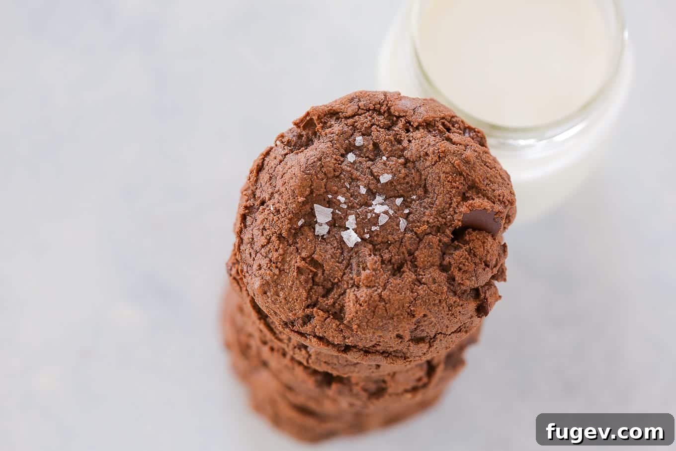Pure Double Chocolate Bliss 3 a stack of double chocolate chip cookies.