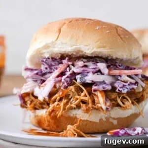 Slow cooker barbecue pulled chicken sandwich with cole slaw