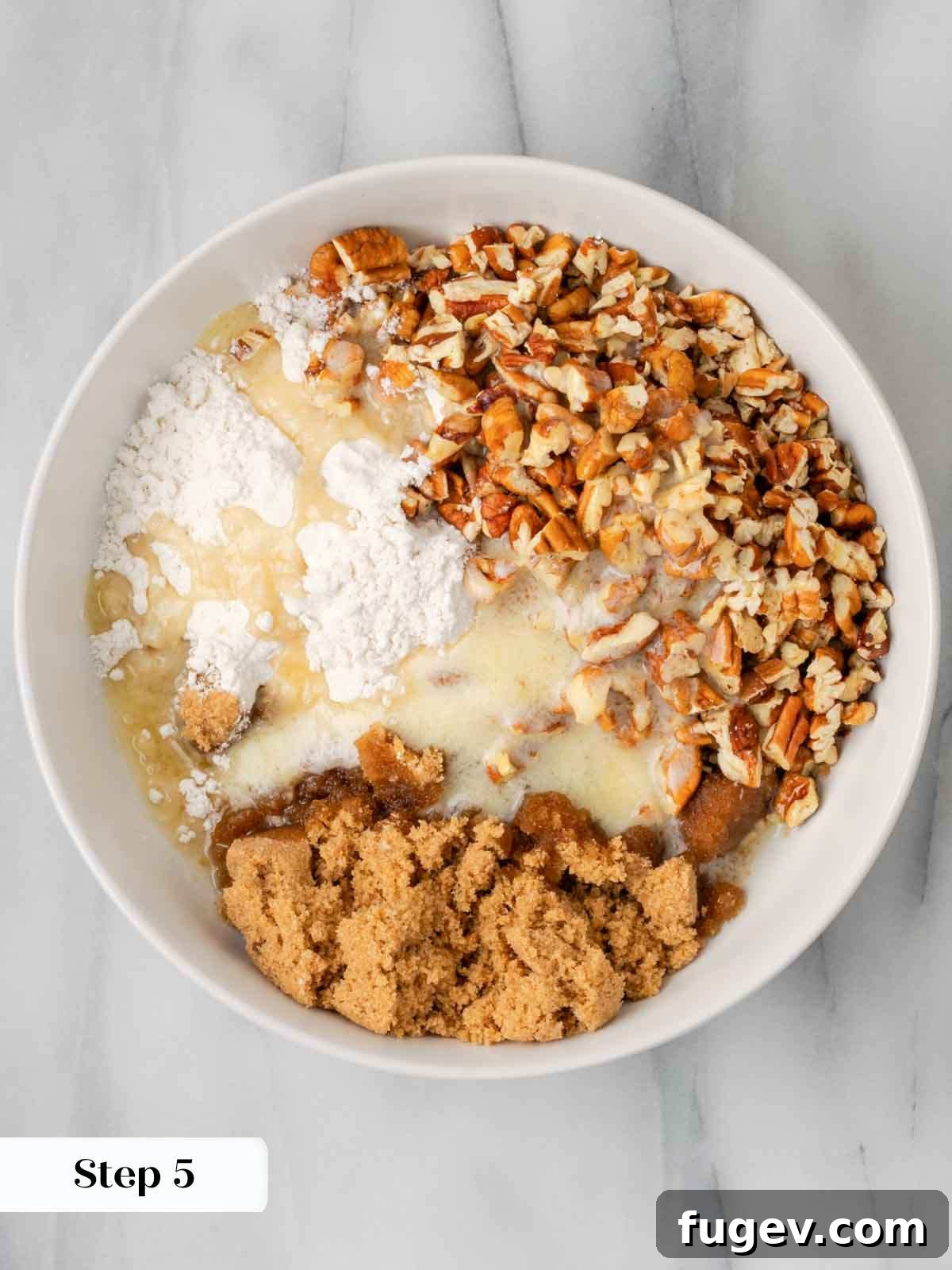 Golden Pecan Sweet Potato Bake 9 Unmixed topping ingredients including brown sugar, flour, butter, and pecans in a bowl.