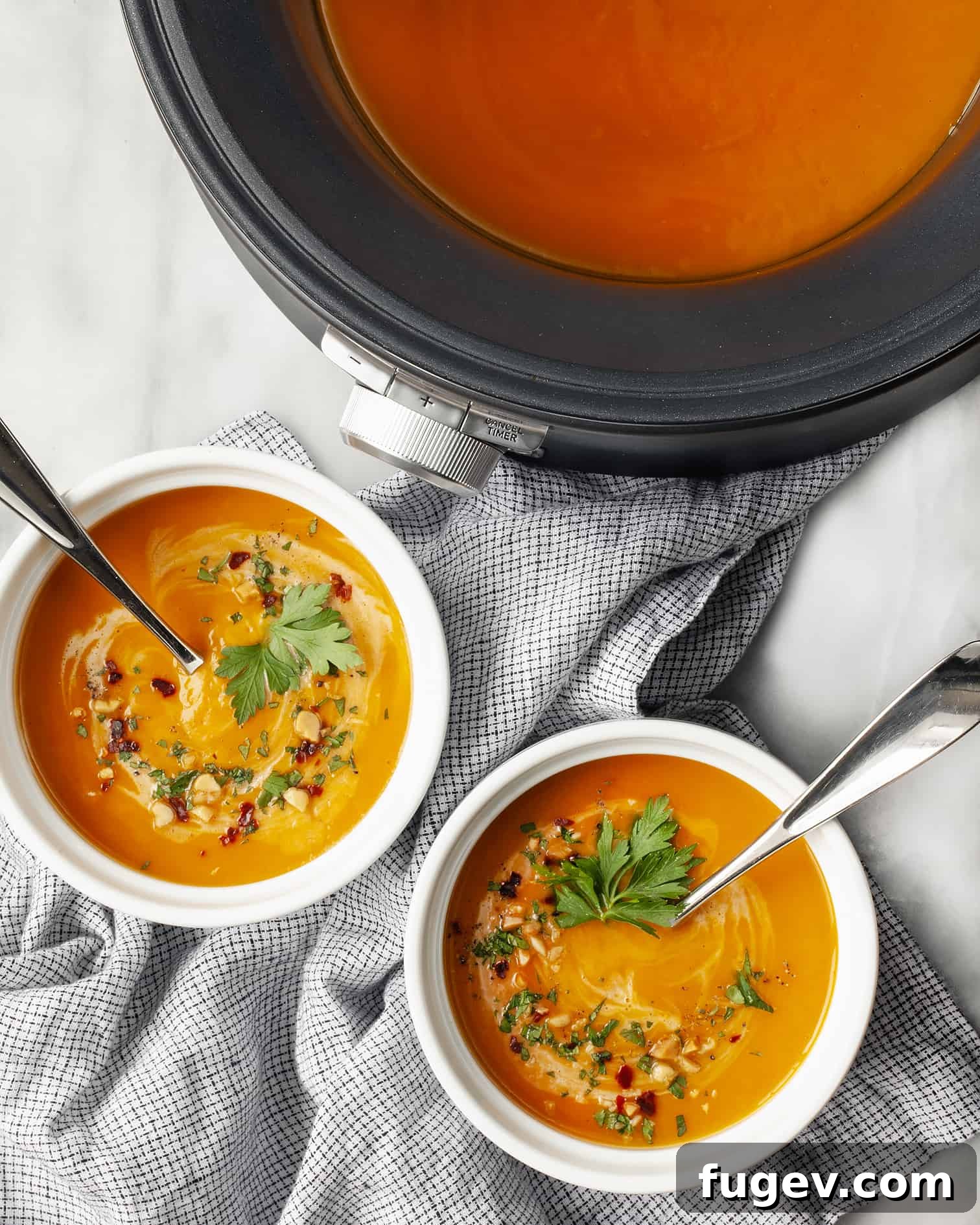 Velvety Slow Cooker Butternut Curry 2 Comforting Slow Cooker Curried Butternut Squash Soup in a bowl