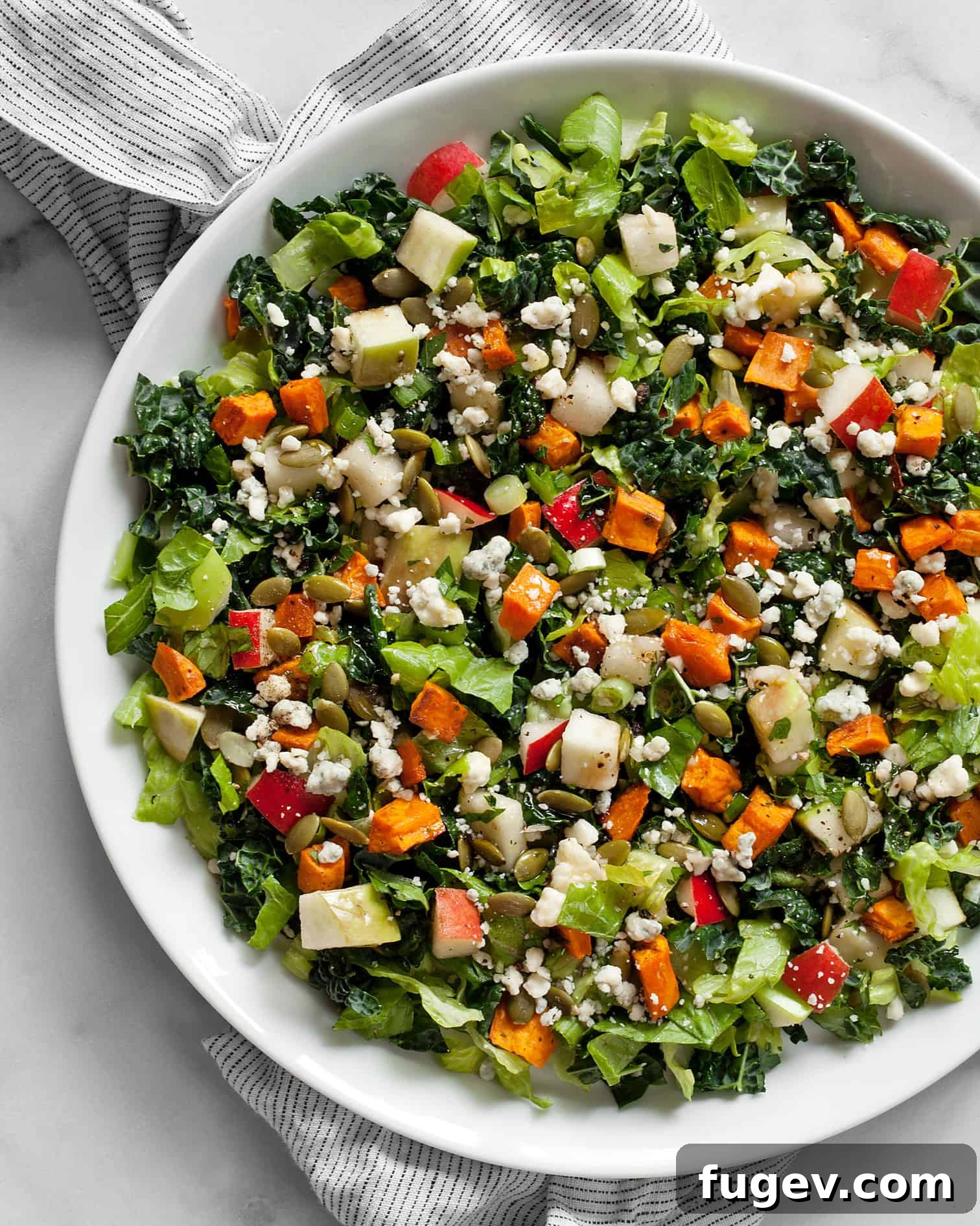 Golden Harvest Chopped Salad 2 Autumn Chopped Salad showcasing roasted sweet potatoes, apples, pears, kale, and romaine