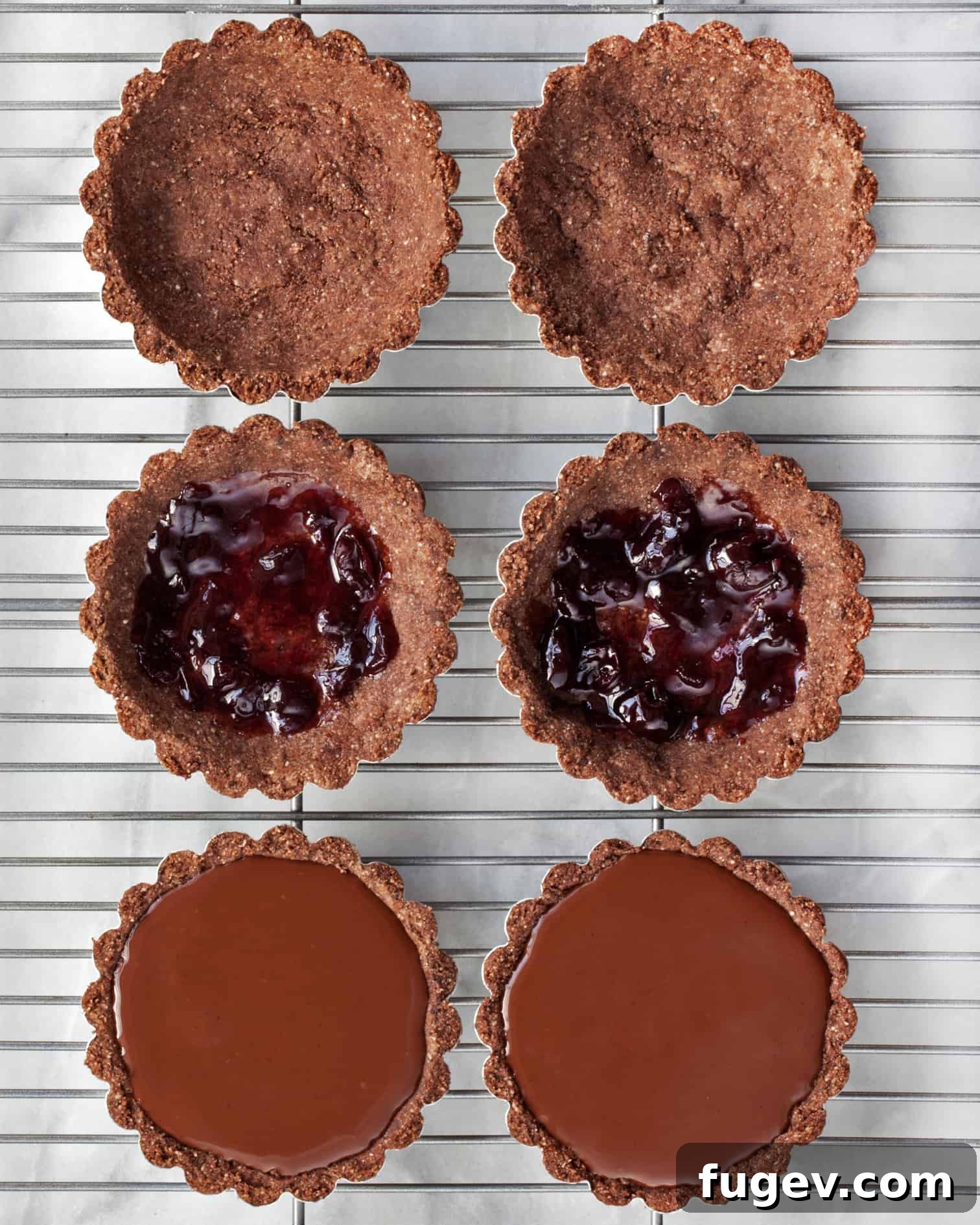 Luscious Vegan Gluten Free Chocolate Cherry Tartlets 2 Close-up of a Vegan Chocolate Cherry Tartlet topped with frozen mousse