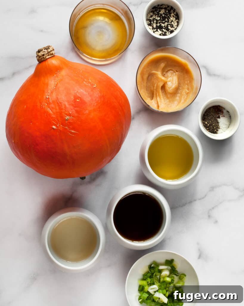 Umami-Glazed Crimson Kuri Squash 3 Collection of ingredients including red kuri squash, white miso paste, sesame oil, maple syrup, and spices.