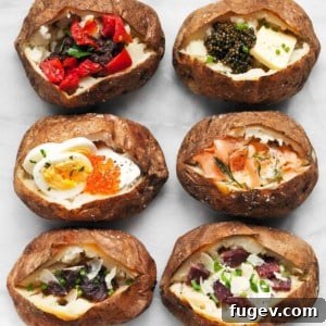 Six baked potatoes all with different toppings.