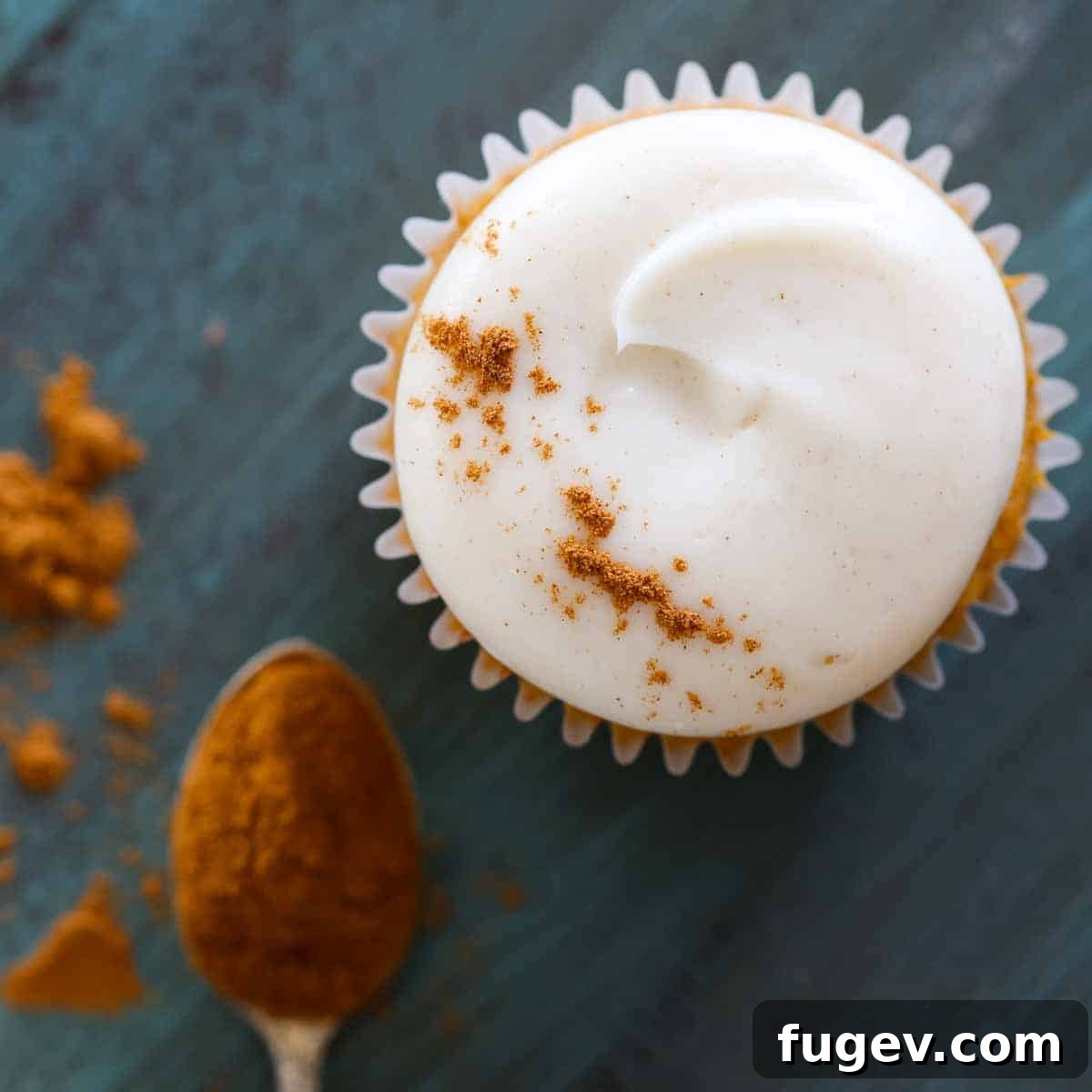 Lush Cream Cheese Buttercream 3 Spiced cream cheese buttercream on a pumpkin cupcake.