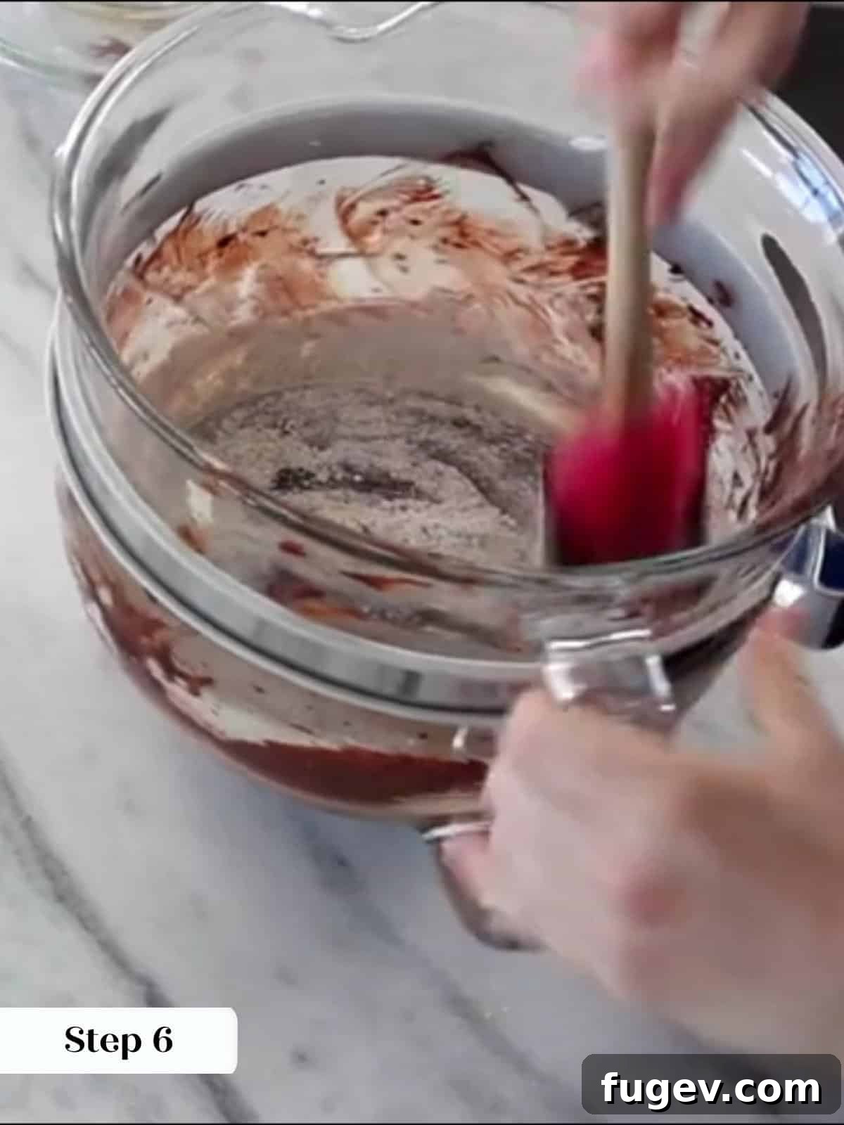 Peppermint Fudge Brownies 12 Carefully folding the flour mixture into the brownie batter until just combined, ensuring no overmixing.