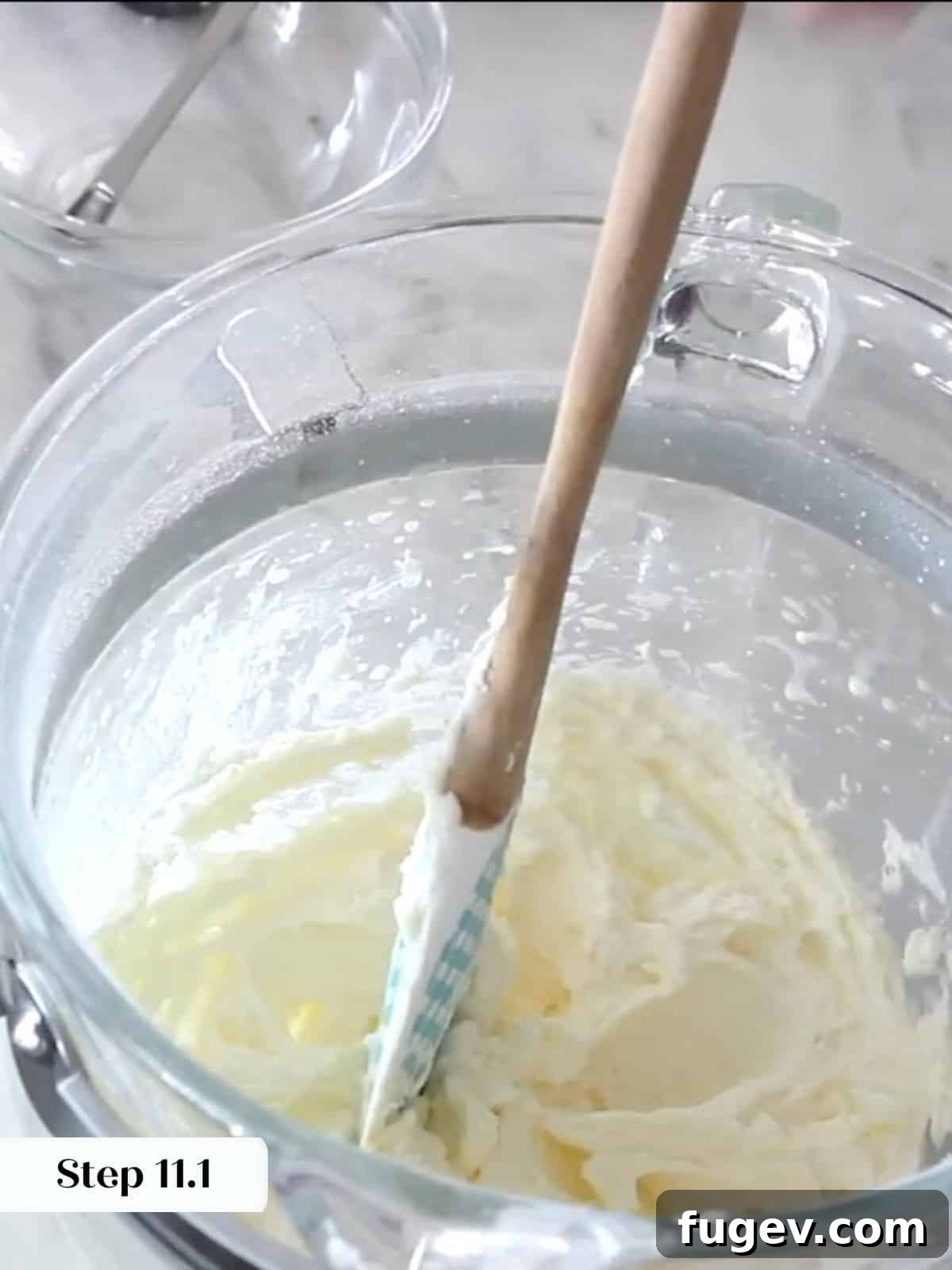 Peppermint Fudge Brownies 16 Partially mixed buttercream ingredients, showing a thick, heavy texture before further whipping creates volume.
