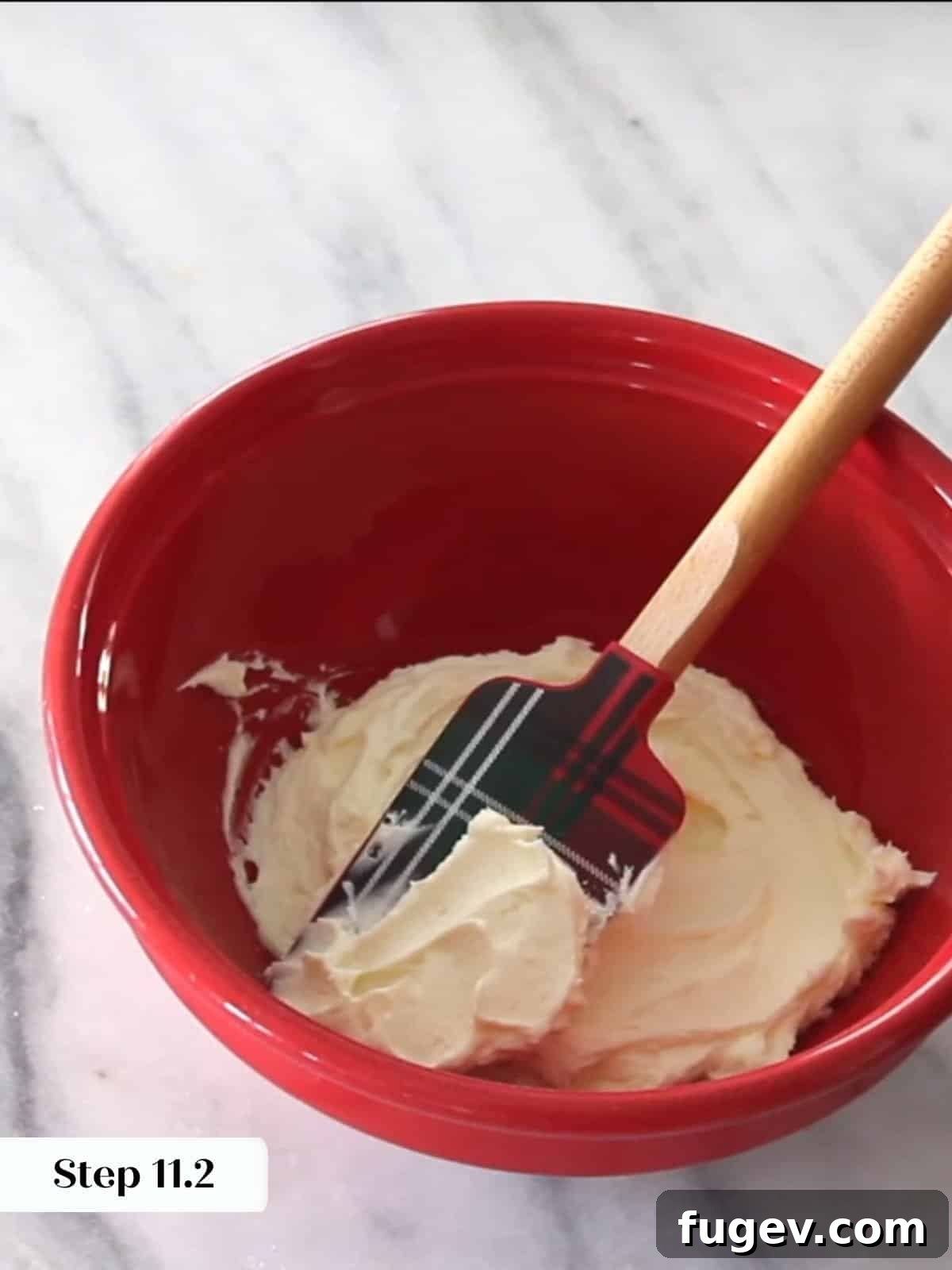 Peppermint Fudge Brownies 17 Finished peppermint buttercream frosting, displaying an airy texture, pale color, and soft peaks suitable for piping or spreading.