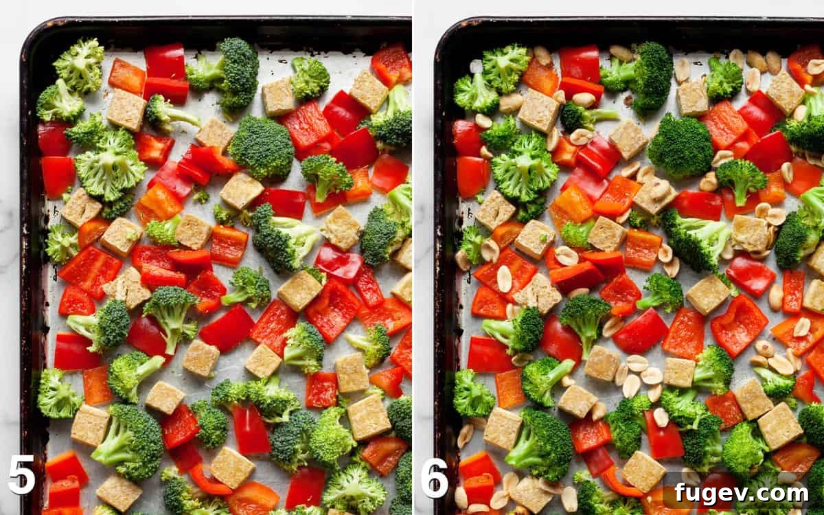Spicy Kung Pao Tofu 6 Broccoli, peppers, and tofu on a sheet pan partially cooked. Peanuts are then added to the pan with tofu and veggies.