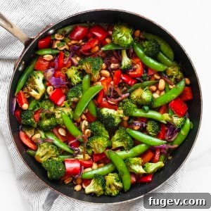 Nutty Vegetable Stir-Fry 8 A close-up of the finished peanut vegetable stir-fry in a skillet, ready to serve.