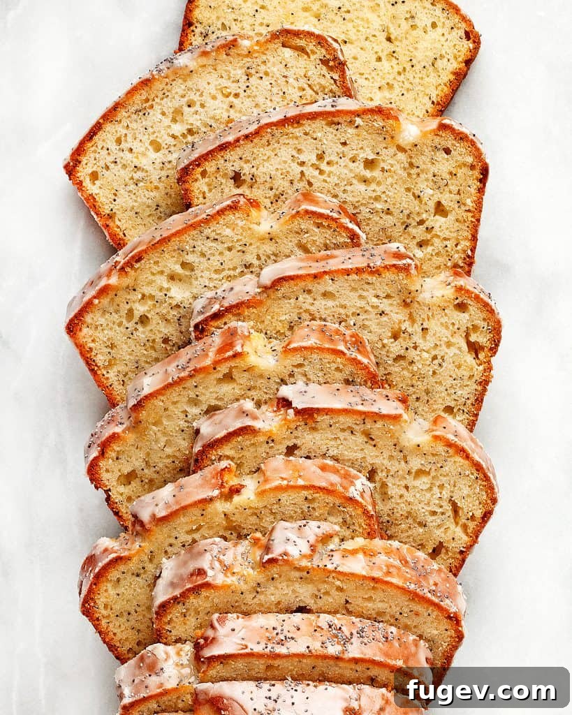 Zesty Grapefruit Poppy Seed Loaf 3 Close-up of Grapefruit Poppy Seed Loaf Cake, showing the golden crust and poppy seeds.