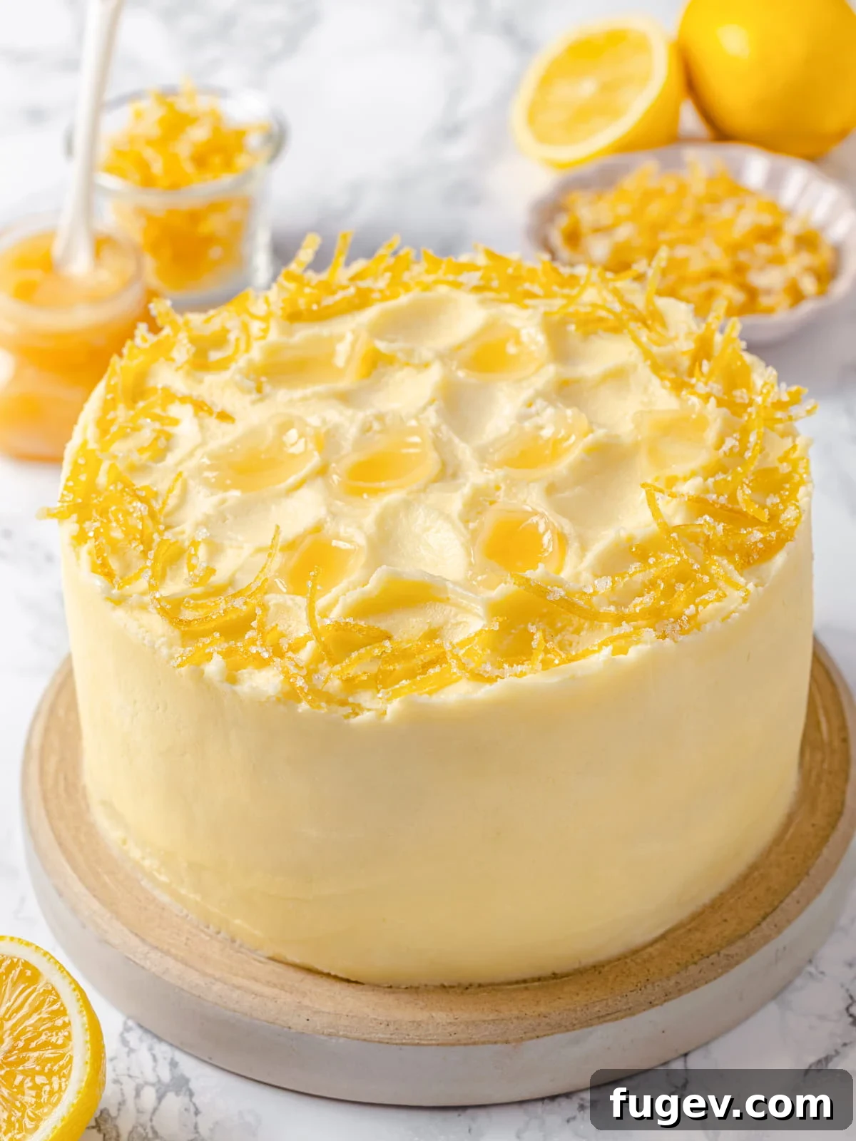 Dreamy Lemon Cloud Frosting 2 Fully frosted lemon cake finished with smooth lemon Swiss meringue buttercream.