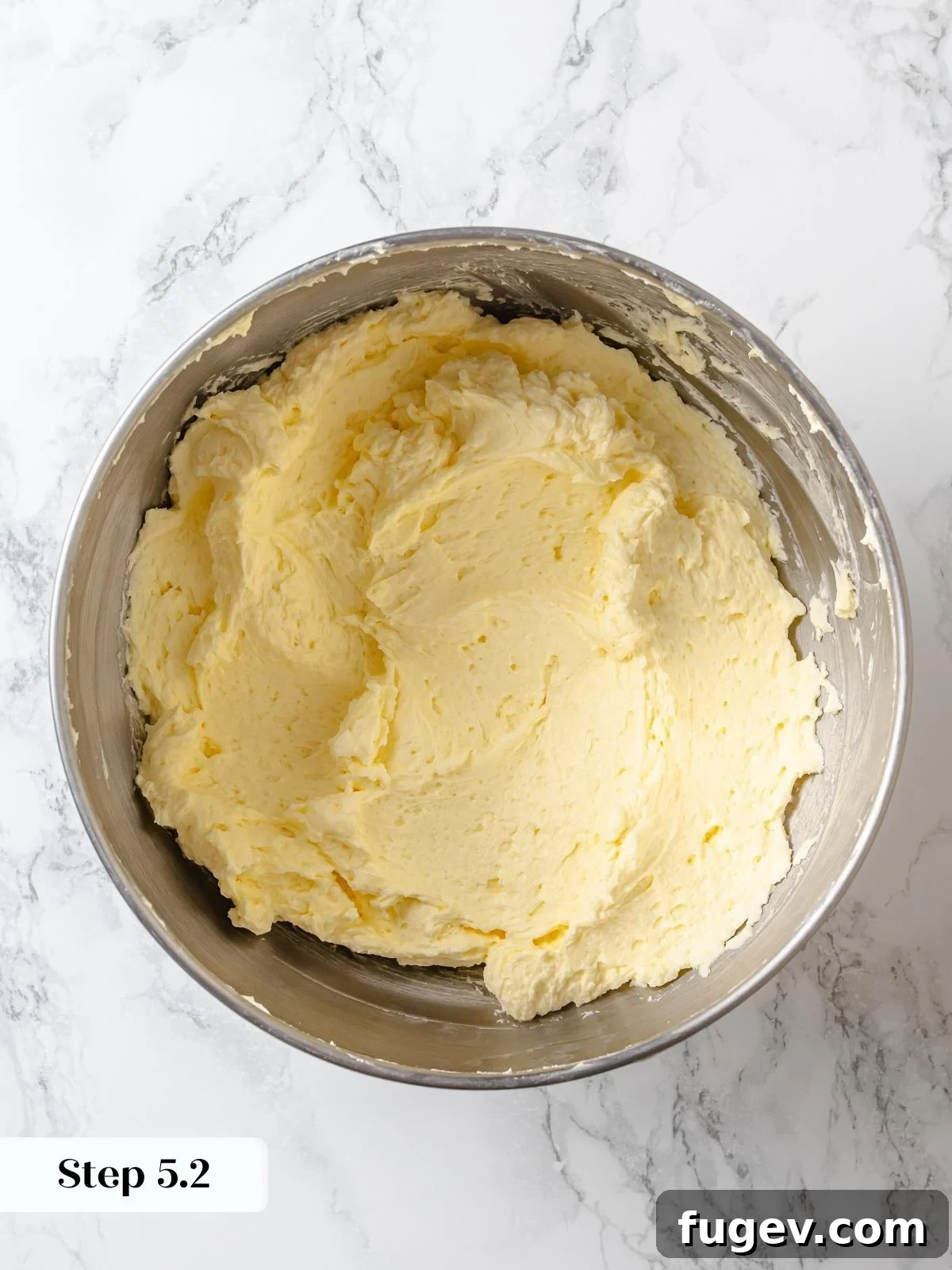 Dreamy Lemon Cloud Frosting 12 finished lemon Swiss meringue buttercream for bright citrus flavor.