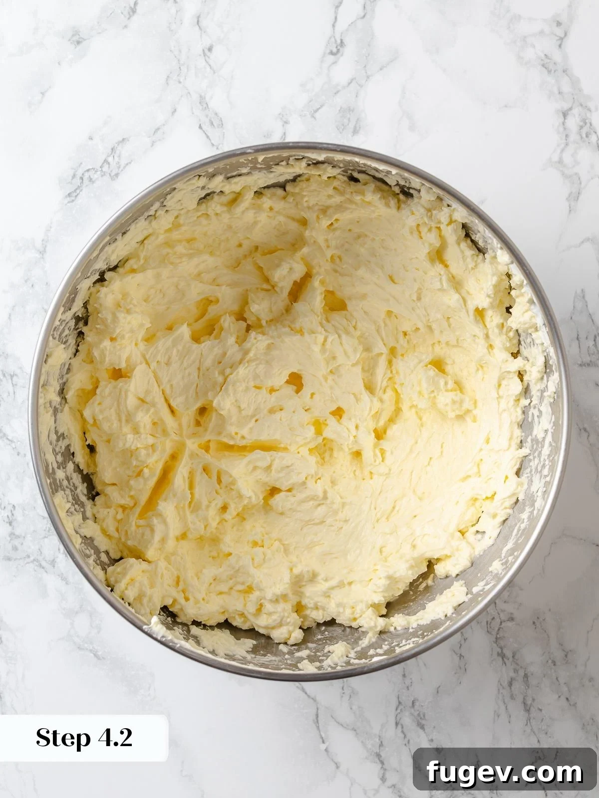 Dreamy Lemon Cloud Frosting 10 Butter mixed into Swiss meringue, transforming it into a smooth buttercream.