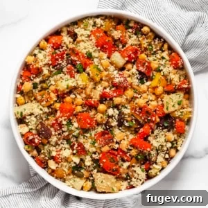 Roasted carrot chickpea couscous in a bowl, ready to serve.