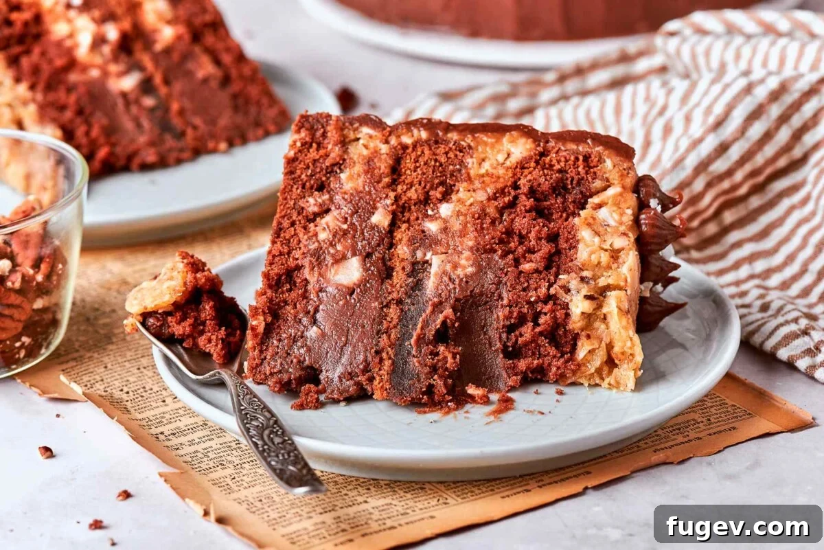 Decadent German Chocolate Cake 7 A delectable slice of German chocolate cake with a bite taken, revealing the tender chocolate crumb, luscious ganache, and rich coconut pecan frosting.