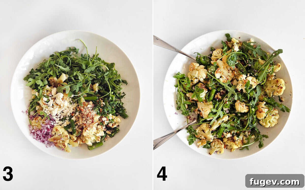 Golden Roasted Asparagus and Cauliflower Delight 5 Salad ingredients assembled in a large bowl, with dressing being tossed with salad.