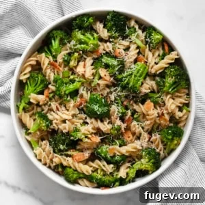 Roasted broccoli pasta salad in a bowl.